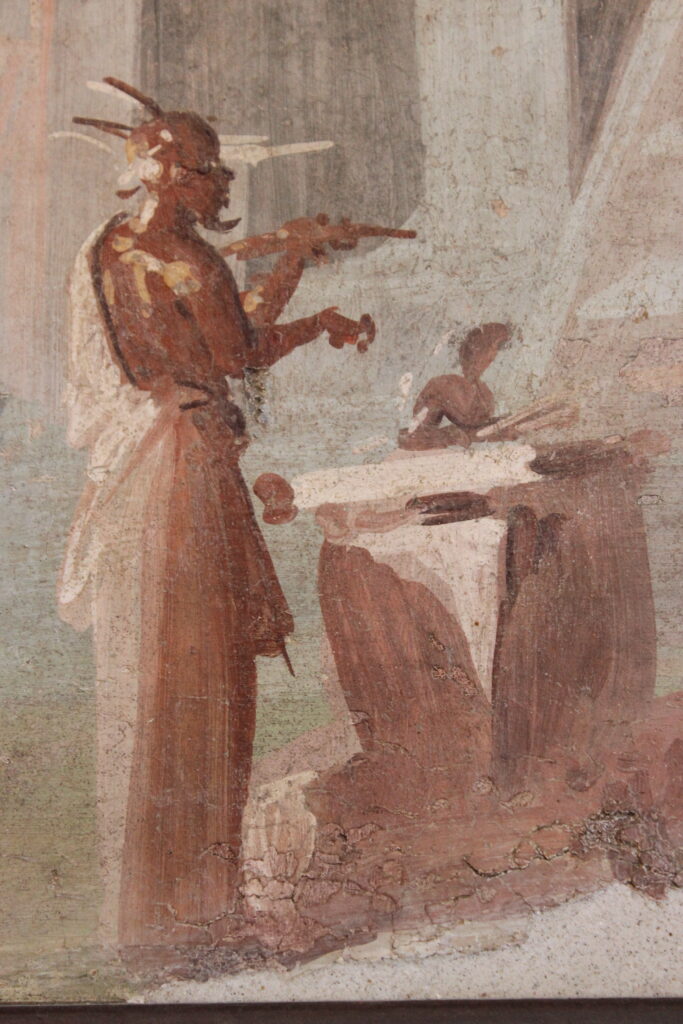 Roman wall painting from Pompeii showing an Egyptian priest